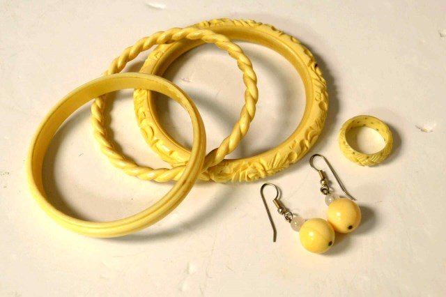 3 Ivory Carved Bangles, Earrings & Ring: 3 ivory carved bangles, along with ball drop earrings, 1 1/2" in length with 12mm beads and ring, finger size 7 1/2".