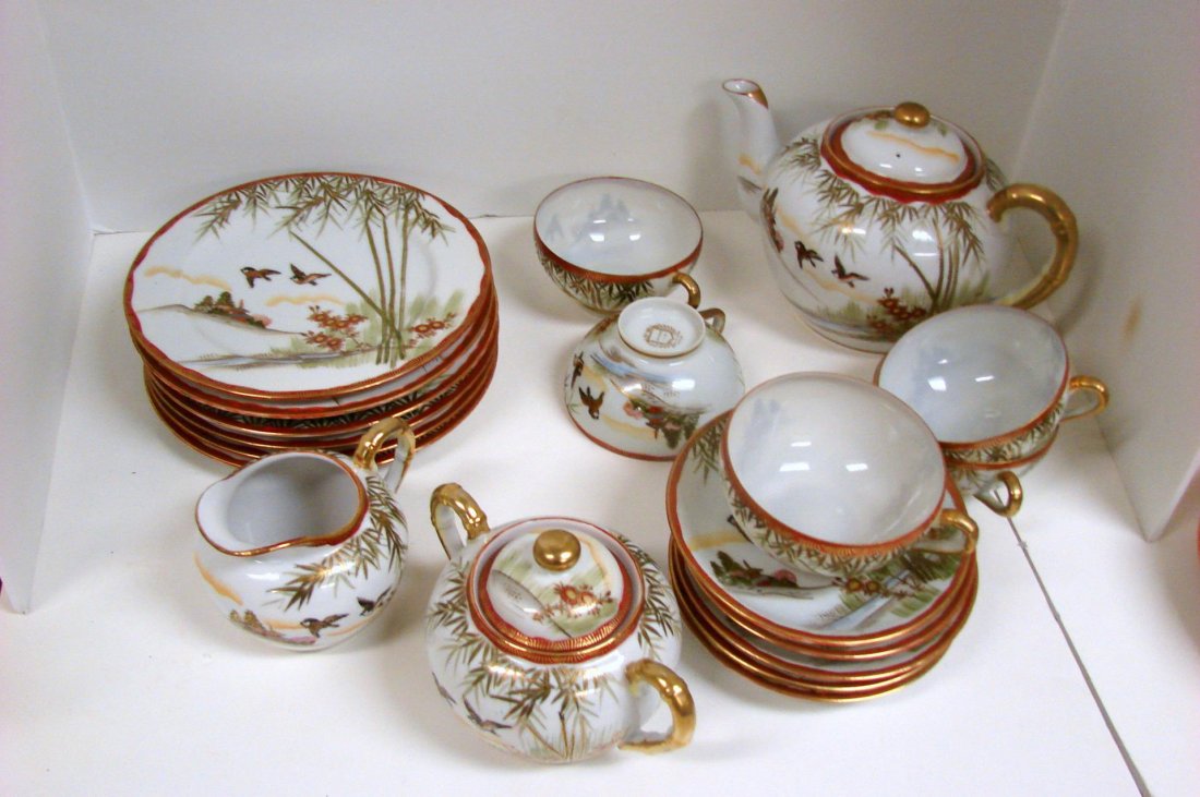 Vintage Japanese Kutoni Tea Set: Vintage Japanese Kutoni Tea Set consisting of 6 cake plates, 5 cups and saucers, teapot, sugar and creamer.