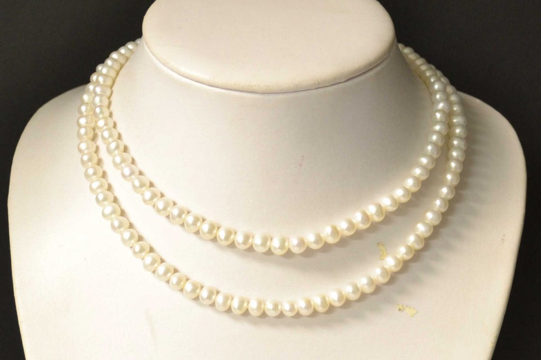 72" Strand of White Freshwater Pearls: 72" fresh water pearl necklace with 8mm pearls, white and well matched, high luster and continuous strand.