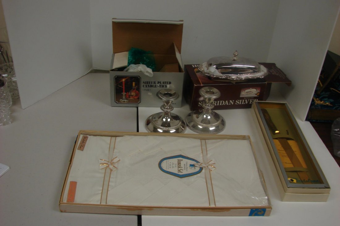 NIB Damask Table cloth, Butter Dish, Candle Hldr: New In Box Damask Table cloth with napkins 60" x 90", Silver Plate Butter Dish and a pair of Candle Holders in original box, bread knife in original box.