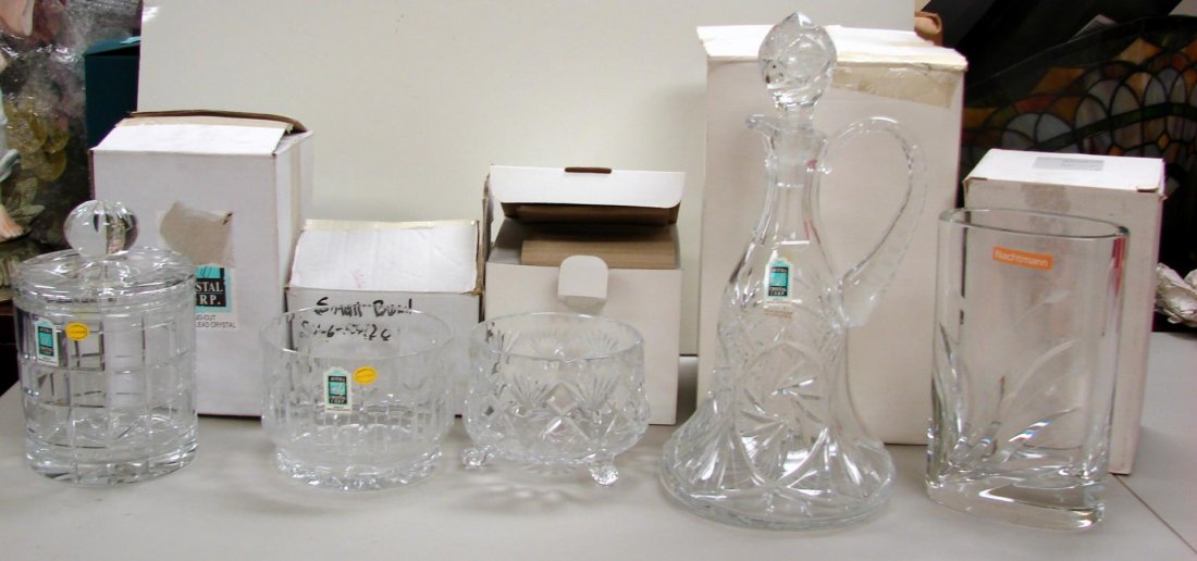 5 pcs. Avitra Crystal: Cookie Jar, Vase, Decanter: 5 pcs. Avitra Crystal: Cookie Jar 7.5" tall, Vase 8.25", Decanter 14", Footed Bowl 5" dia., Round Bowl 5.75" dia. All new in original boxes.