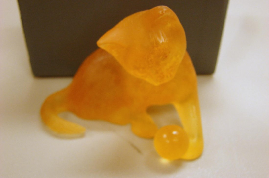 Daum Nancy France Amber Yellow Sitting Cat: Daum Nancy France Amber Yellow Sitting Cat playing with a ball, 3" wide x 2.25" high.