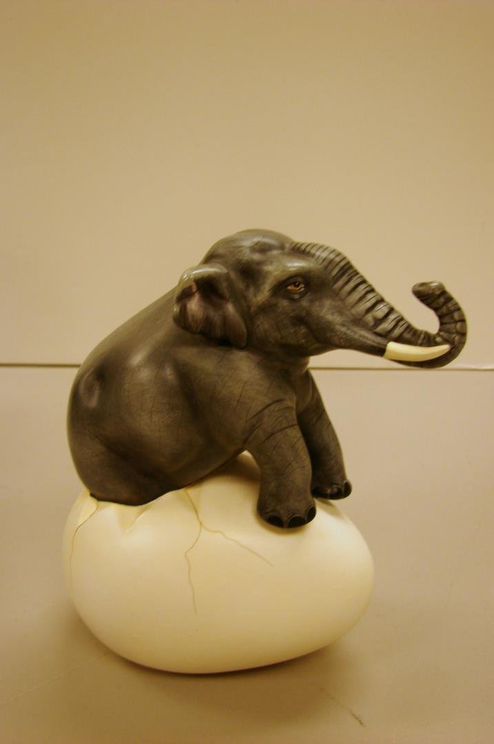 Sergio Bustamante Elephant Sitting on Egg: Sergio Bustamante Elephant Sitting on Egg, 7" tall.