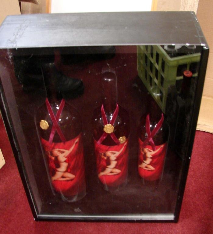 Marilyn Monroe Merlot Velvet Col. 2002 - Magnums: Marilyn Monroe Merlot Vertical Case Velvet Collection, 2002 - 1 Double Magnum, 1 Magnum and 1 750 ml. In wooden box with Plexiglas front. Most of these vintages were destroyed in a warehouse fire in 2