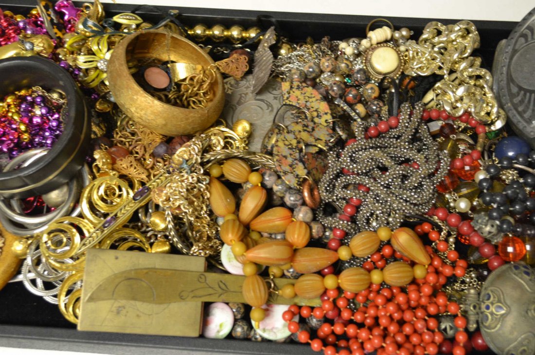 Lot of Costume Jewelry: Lot of costume jewelry, beaded necklaces, vintage pins, bangles, earrings, letter openers and more.