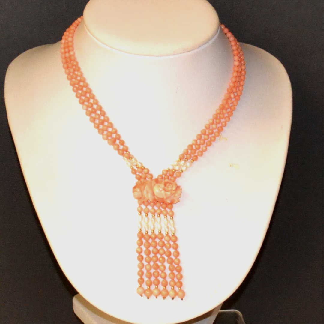 Angel Skin & Pearl Necklace: Angel skin coral necklace, 3-30" strands with 4" beads, single knotted with 4" rose drop with freshwater pearls.