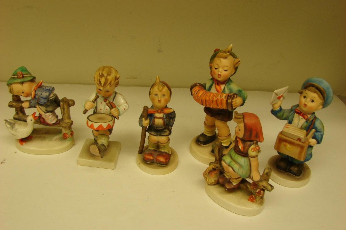 6 Hummels: Barnyard Hero, Little Hiker & Drummer +: 6 Hummels: Barnyard Hero #195 3 3/4", Little Hiker #16, Little Drummer #240, Accordion Boy #185, Postman #119, Just Resting #112, tiny paint flake on her foot . No other chips.