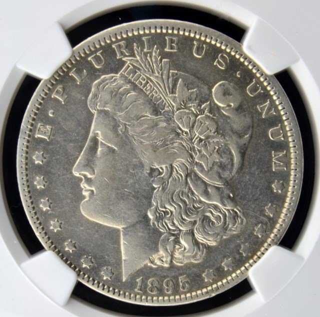 1895 O Morgan Silver Dollar NGC VF Details I/C: 1895 O Morgan Silver Dollar NGC VF Details Improperly Cleaned