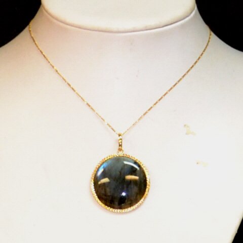 14kyg Labradorite Necklace: 14kyg labradorite necklace with 34mm round labradorite, bezel set in textured 14kyg with 18" chain. 14.8gm