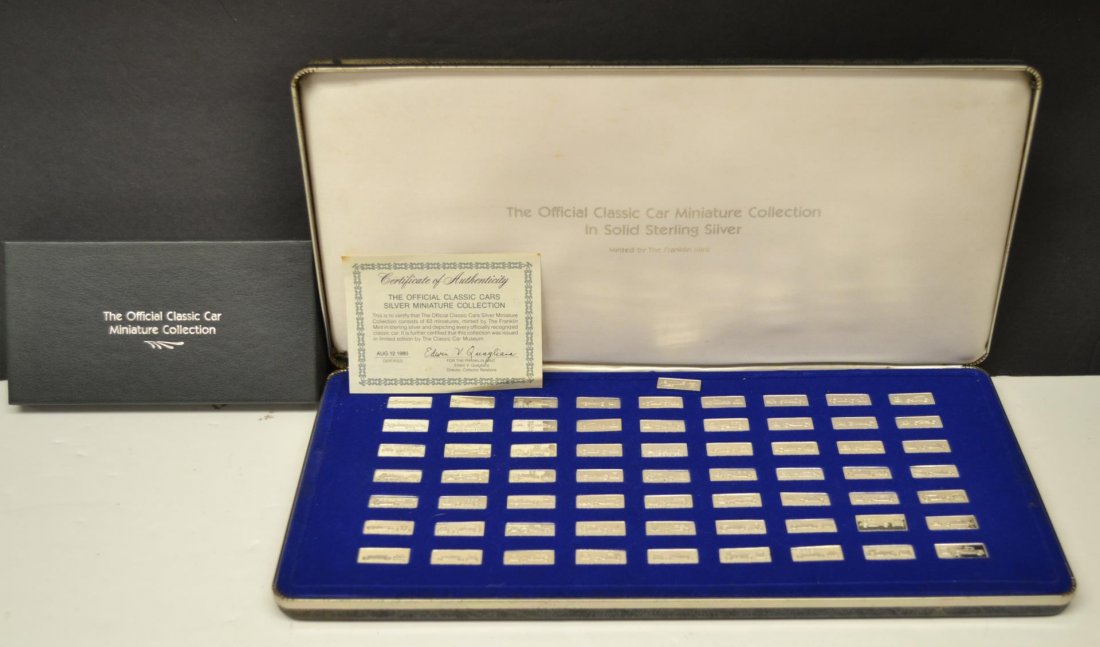 FRANKLIN MINT STERLING SILVER MINIATURE CAR SET: THIS AUCTION IS FOR A FRANKLIN MINT MINIATURE CAR COLLECTION SET. THIS SET HAS 64, STERLING SILVER MINIATURE CAR'S (92.5% PURE SILVER).THE CASE IS IN GOOD CONDITION,AND IT COMES WITH CERTIFICATE OF AU