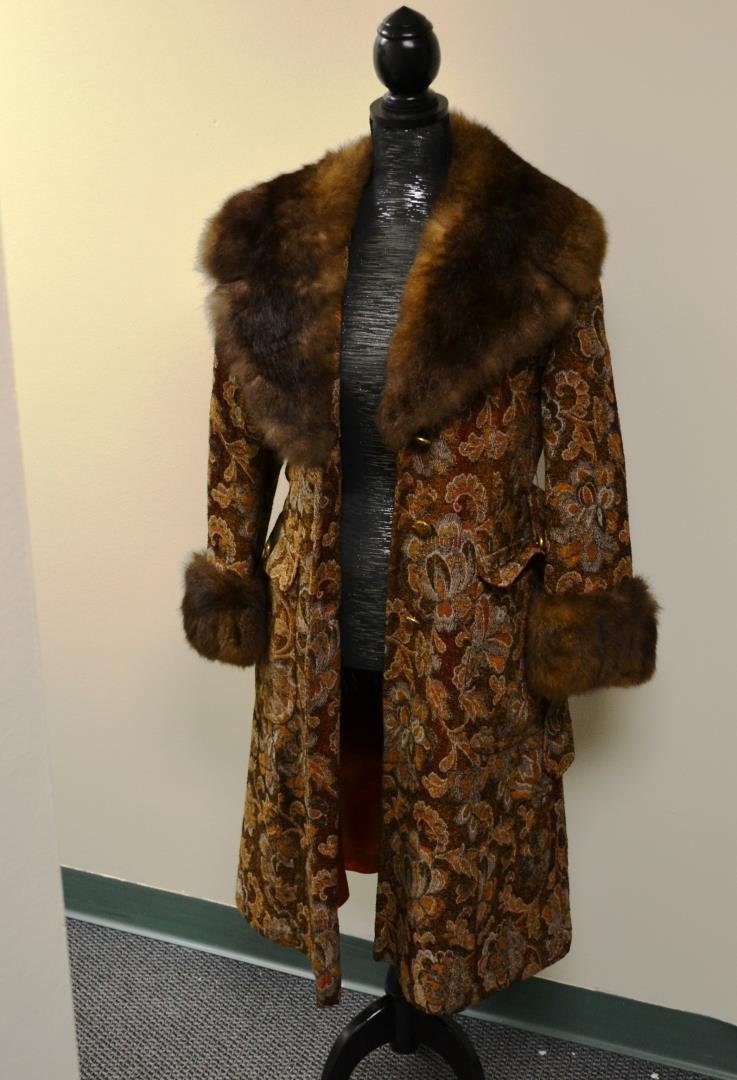 Vintage winter coat with fur collar and cuffs: Vintage winter coat with fur collar, cuffs, and matching belt. Approx 43 1/2" from top of collar to the bottom, approx 18" from shoulder to shoulder, approx 23" from top of shoulder to cuff, approx 15