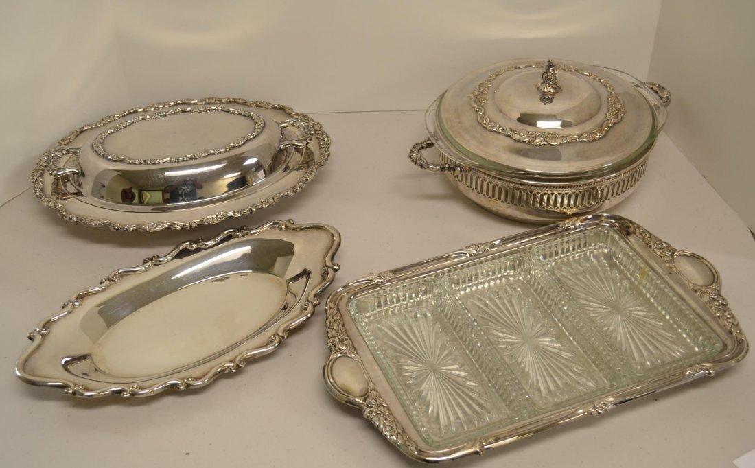 4 pcs silver plate serving lot: 4 pcs silver plate serving lot, includes Rodgers bread tray, Wallace covered dish with pyrex glass insert, Gorham condiment tray, and unmarked covered veggie dish.