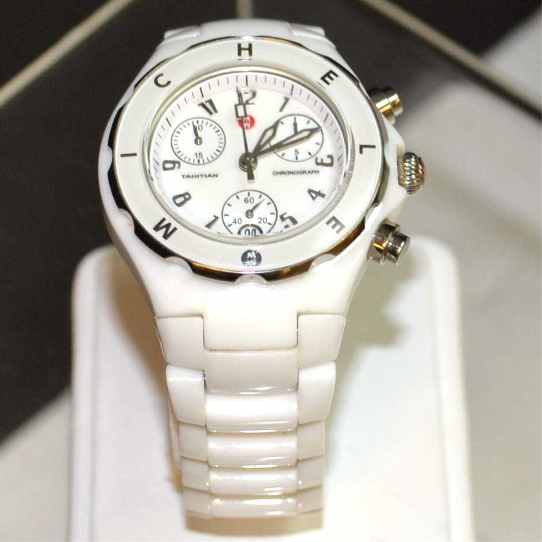 Michelle White Ceramic Watch: Lady's Michelle watch model # MWW12A000002 with white ceramic chrono dial, date, Swiss movement, water resistant, ceramic case and double deployment buckle ,ceramic bracelet and good working condition