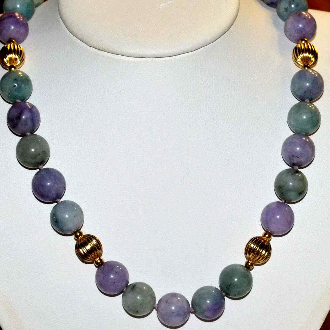 24" Strand Multi Colored Jade Necklace & Earrings: Multi colored jade necklace, 24" in length with lavender and green jade beads, measuring 14mm, along with 10mm corrugated and smooth gold filled 14kyg beads, single knotted with matching earrings.,