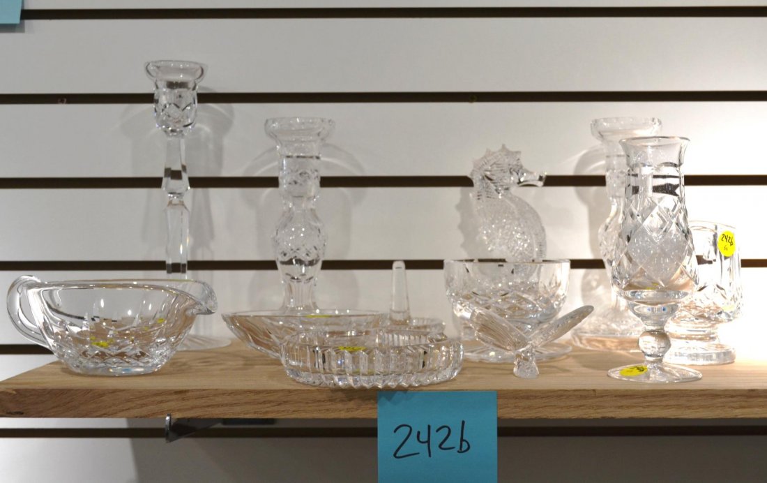 Group Of Waterford Crystal: Group Of Waterford Crystal. Includes candlesticks, candy dishes, gravy, creamer and bud vase, 1" to 9 1/2"h.