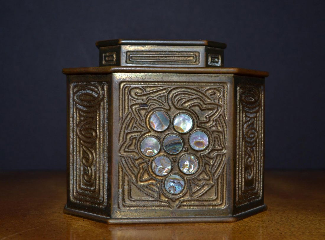 Signed TIFFANY STUDIOS NEW YORK INKWELL: Signed TIFFANY STUDIOS NEW YORK #1157 Circa 1910, this Abalone pattern was a very popular Tiffany piece. This has original patina. It is missing two piece's of abalone. It measures 3 1/4" x 3"There is