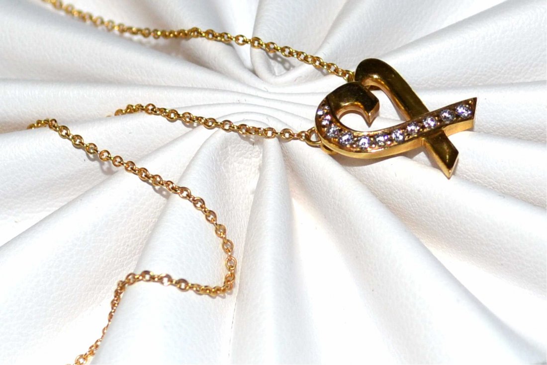 18kyg Tiffany Diamond Heart Necklace: 18kyg diamond heart necklace by Paloma Picasso for Tiffany & Co, 11 prong set diamonds with 16" link chain. 3gm