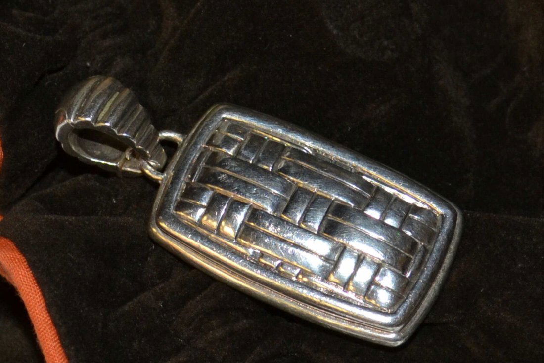 Sterling Pendant By John Hardy: Sterling pendant by John Hardy in the basket weave design, measuring 1 1/2x1" with 6mm bale. 22.2gm