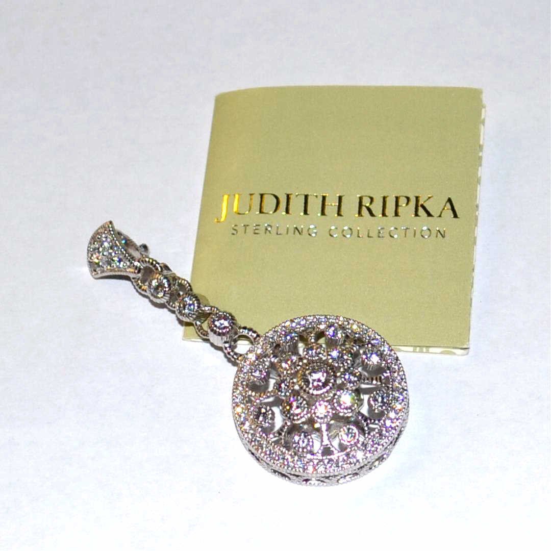 Sterling CZ Enhancer Pendant Judith Ripka: Sterling CZ enhancer pendant by Judith Ripka with prong set CZs, milgrain design, 2" in length with enhancer bale.
