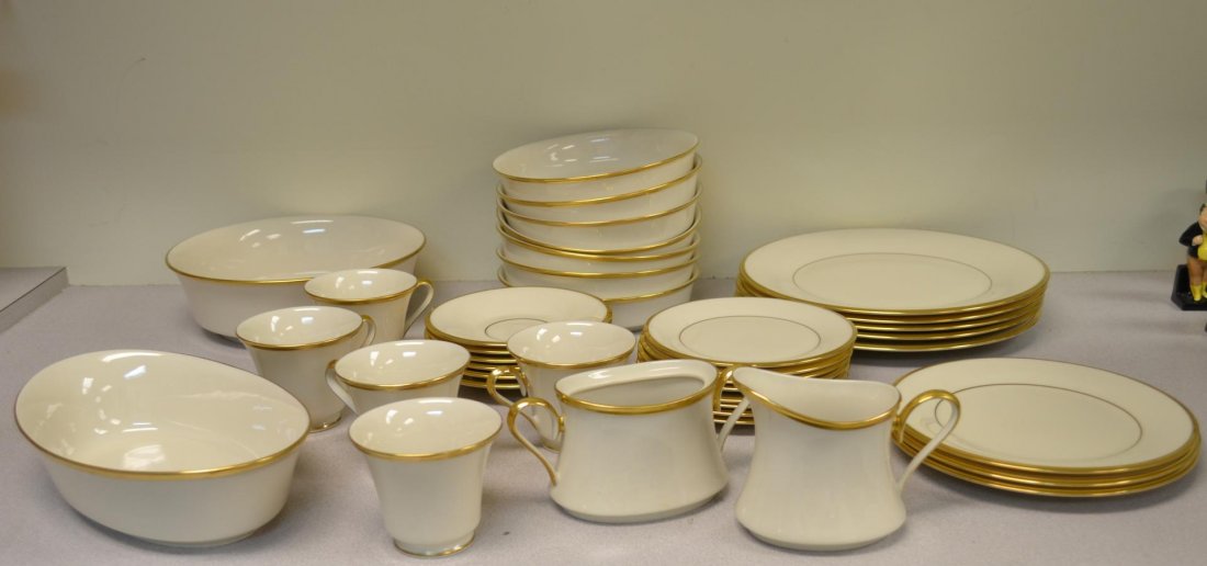 38 piece Lenox dish set eternal pattern: 38 piece Lenox dish set eternal pattern. 5 tea cups, 6 saucers, 5 dinner plates, 3 salad plates, 8 butter plates, 7 cereal bowls, 1 vegetable bowl, 1 serving bowl, 1 cream and sugar no lid for sugar.