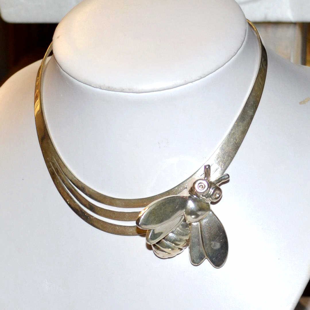Sterling Silver Choker With Ben Ari Bug: Sterling silver choker, graduating design, with sterling bumble bee by designer Ben Ari, measuring 2" in length, 16" in length choker. Can be used as pin.