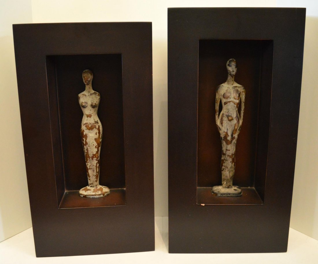 Pair Of Wall Hangings: Pair Of Wall Hangings. Open, shadow box frames with wooden figures of a man and woman, 21" and 22"h.