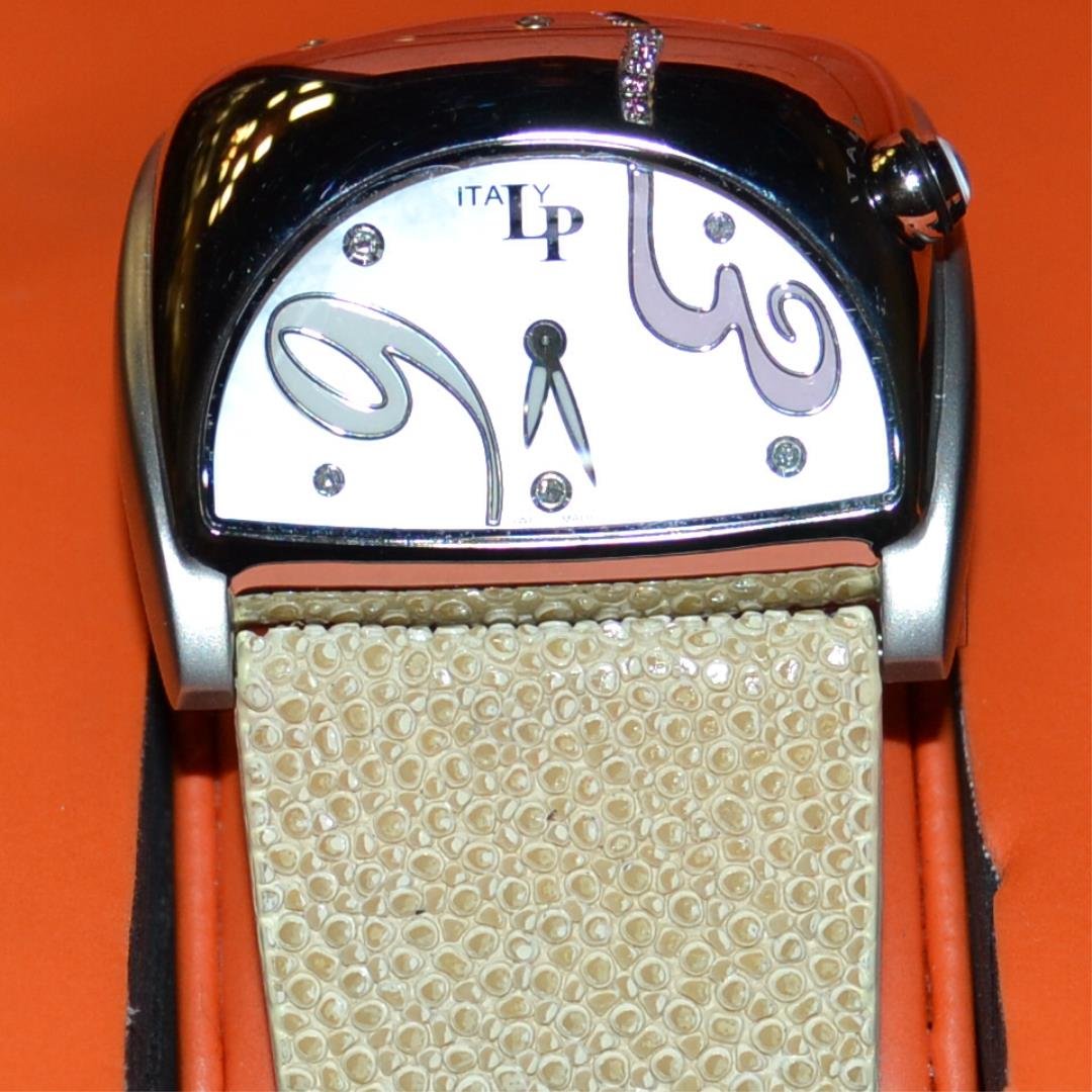 Lady's Lucien Piccard Diamond Stratosphere Watch: Lady's stainless Lucien Piccard Stratosphere watch with diamond mother of pearl dial, stainless case with diamonds and pink sapphires, sapphire crystal, water resistant and beige sting ray band with l