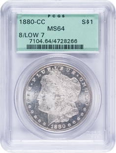 PCGS MS-64 1880-CC 8/Low 7 Morgan Dollar: Modestly PL in appearance, with a soft golden glow on frosty surfaces. Scarce. In an old-style PCGS green label holder with plastic frame.