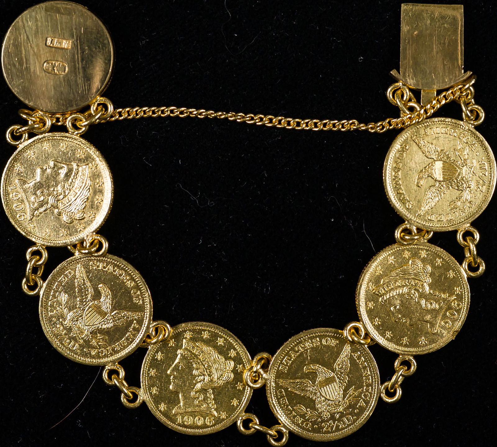 7 Coin Gold Bracelet: A high quality bracelet made of 7 $2.50 Liberty gold coins, all of which are most likely middle eastern copies. The coins tested 23k gold, so there's a lot of gold value here. Total weight is 36.77 gr