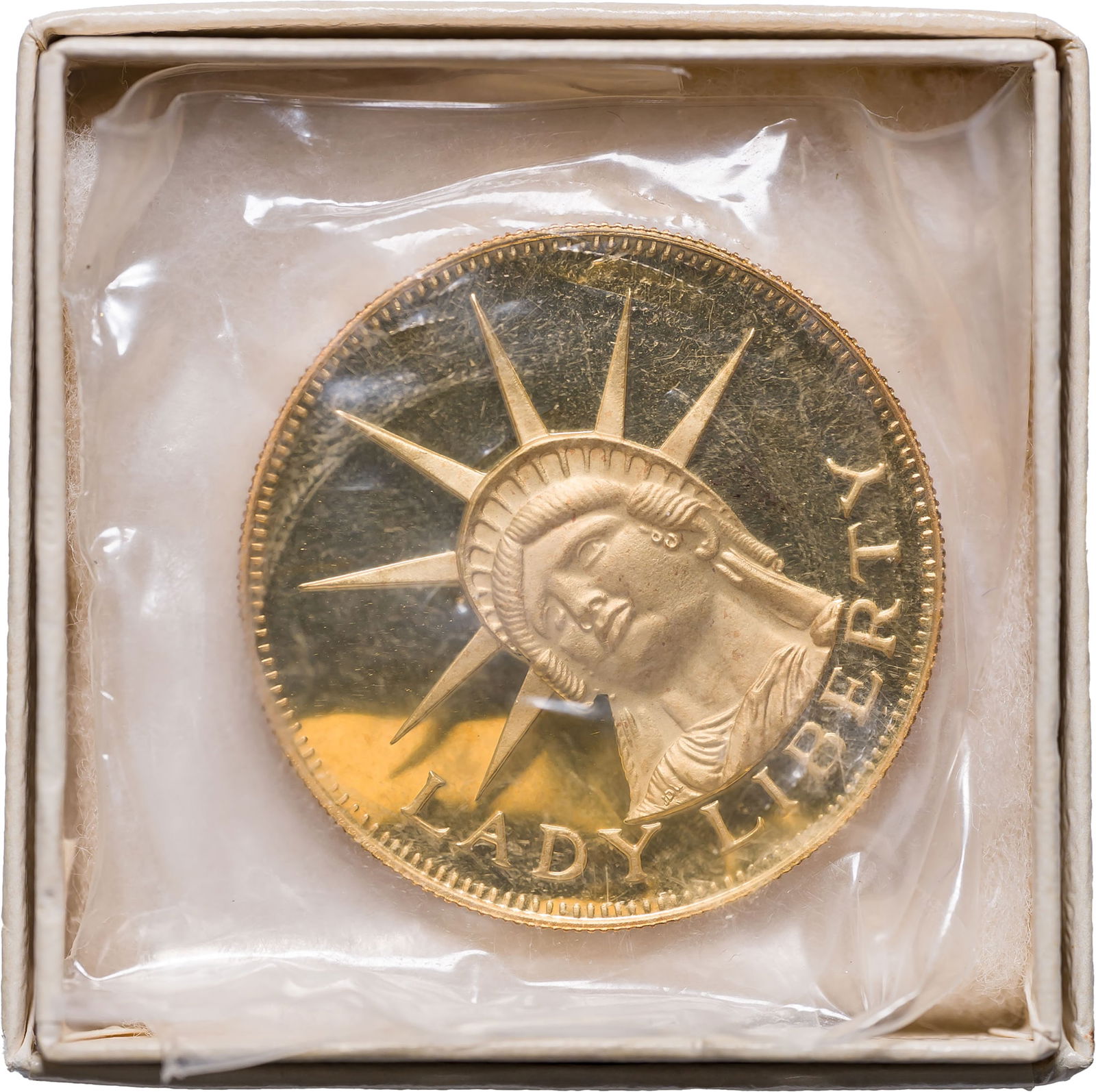 1978 One Ounce Gold Lady Liberty: Still housed in its original plastic.