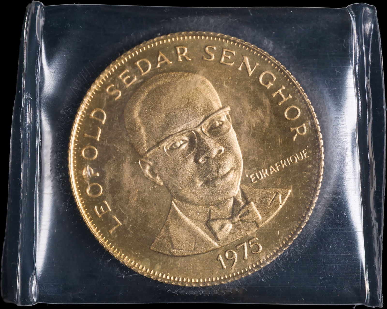 Senegal. Gem BU 1975 500 Francs Gold: Housed in original plastic. Just 500 were struck. Contains .2347 oz of pure gold.