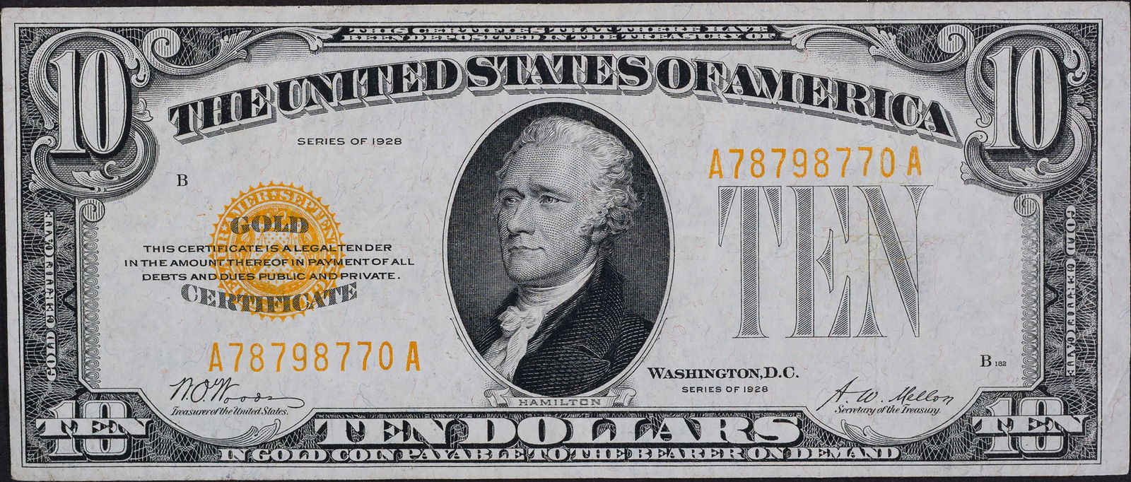 EF+ 1928 $10 Gold Certificate: A crisp example with one light center fold as well as a couple of corner folds.