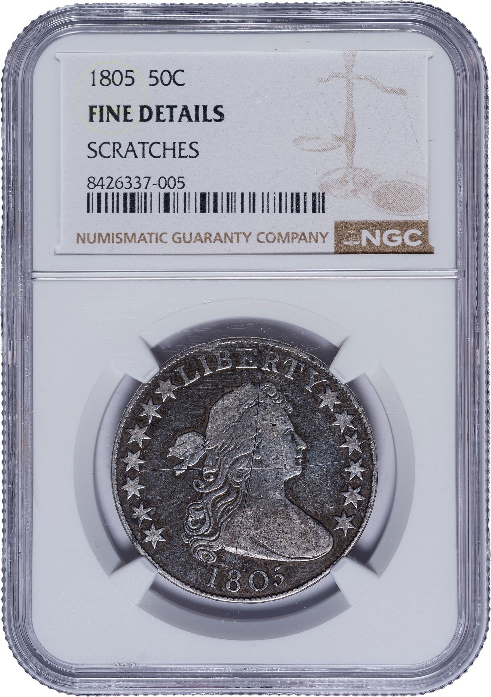 NGC Fine Details 1805 Half Dollar: Scratches. Slate fields and lighter high points form a visually attractive cameo effect. A faint, old "X" can be seen across Liberty's portrait.
