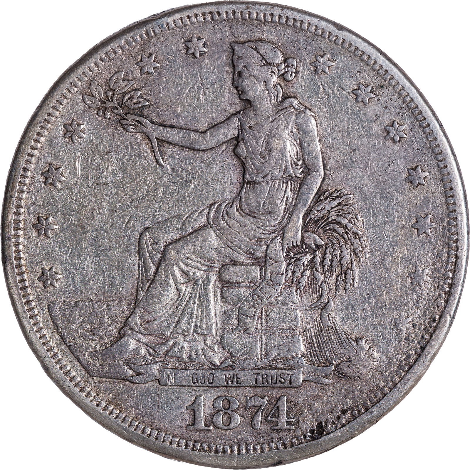 EF-40 Details 1874-CC Trade Dollar: Shows some minor smoothing at the 5:00 obverse rim area.