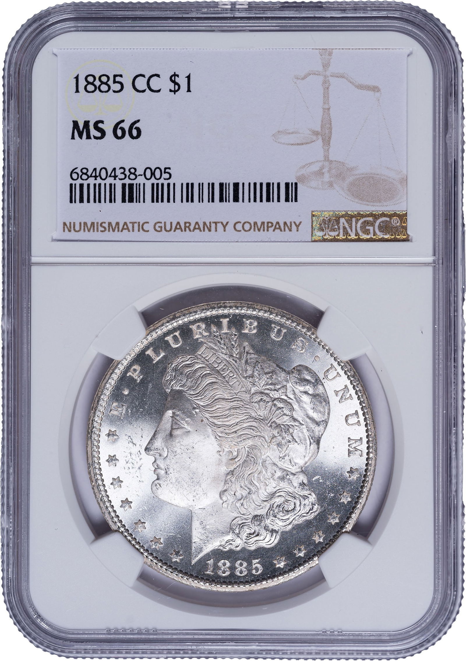 NGC MS-66 1885-CC Morgan Dollar: Brilliant and lustrous with a dusting of pale golden toning, and with PL surfaces both sides.