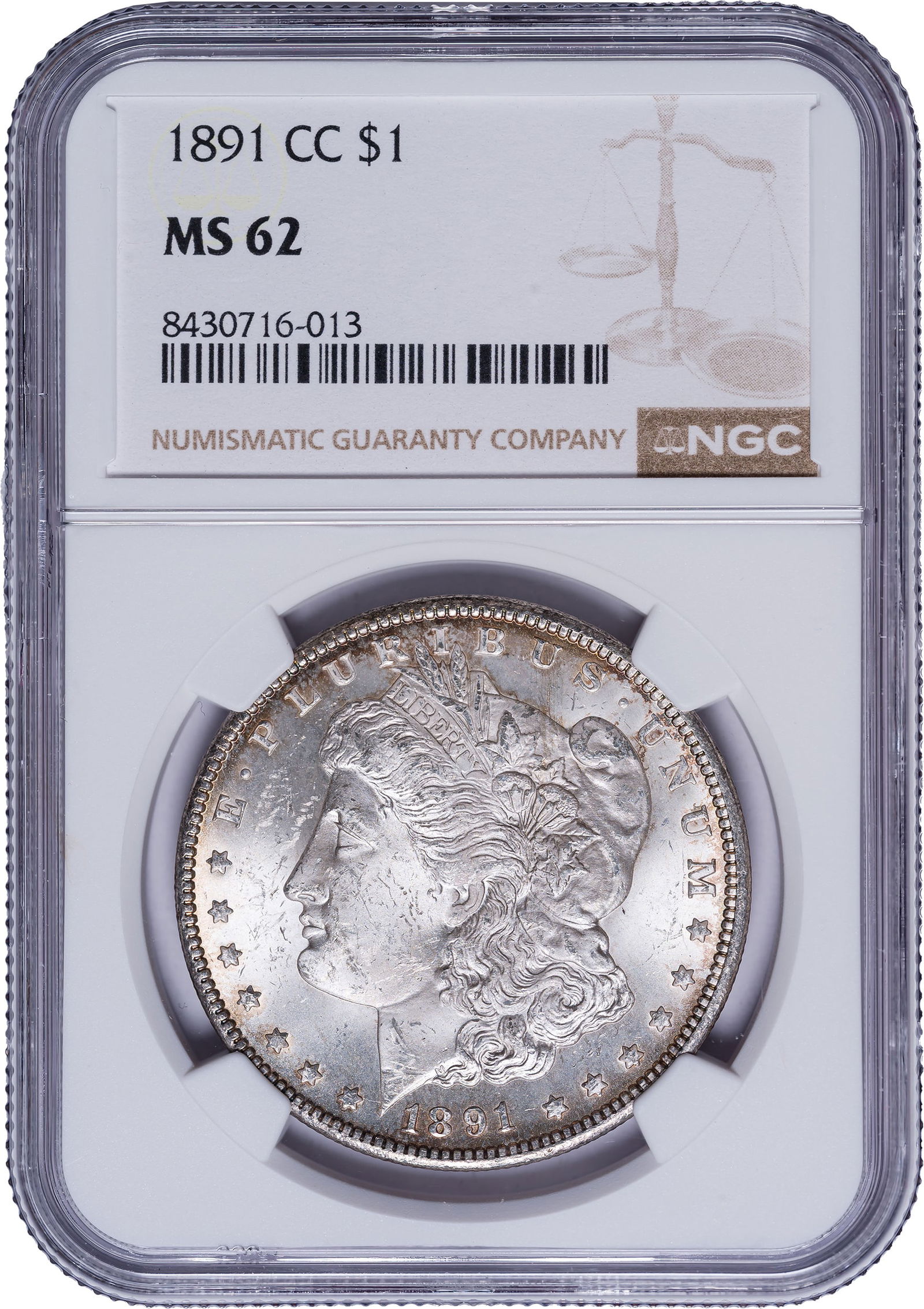 NGC MS-62 1891-CC Morgan Dollar: Choice for the grade with a good amount of mint luster still present. Rich golden halos are forming at the rims. Finer than the typical MS-62 example.