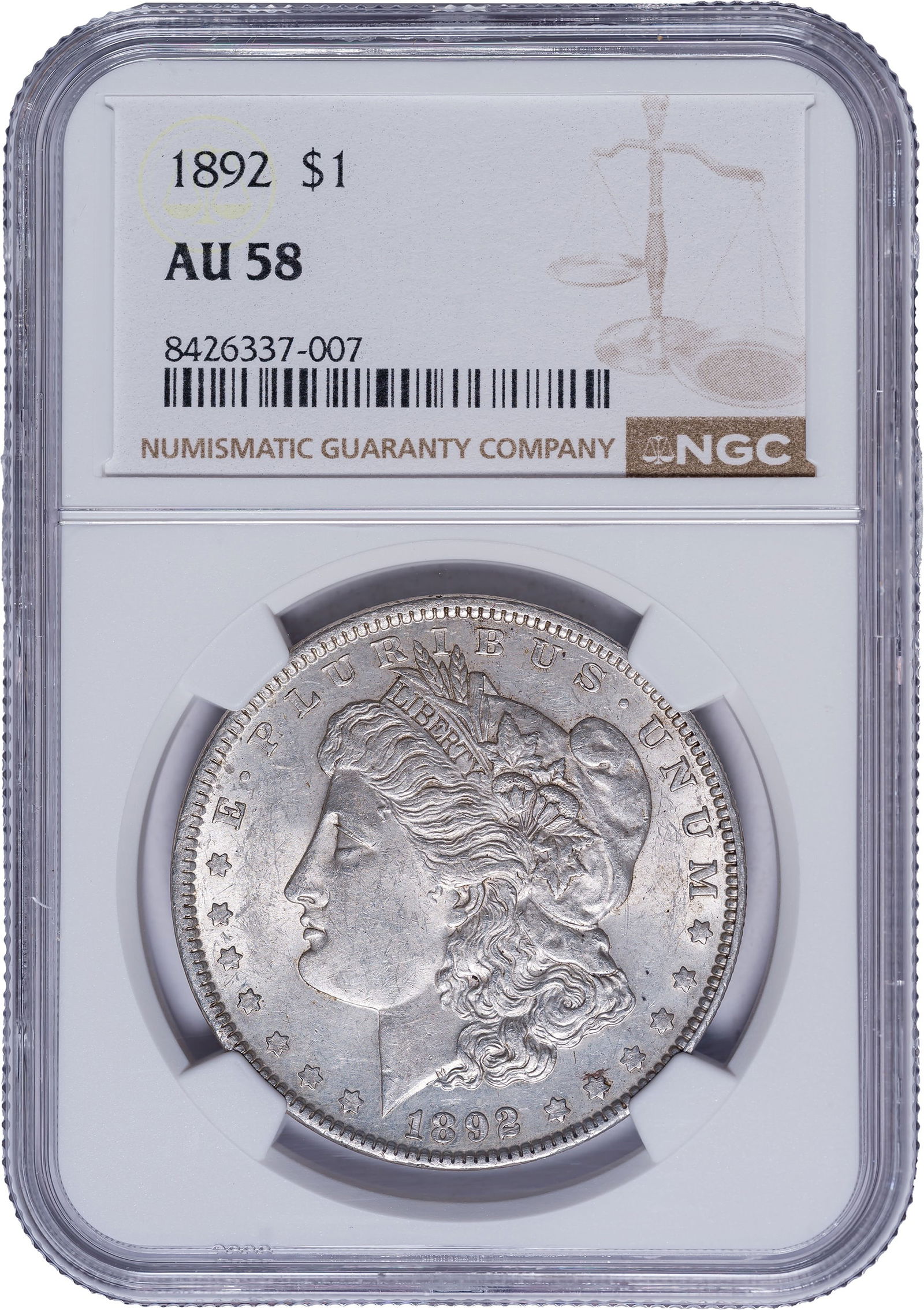 NGC AU-58 1892 Morgan Dollar: Soft golden-gray with bold luster, and with just a trace of rub on the design high points.