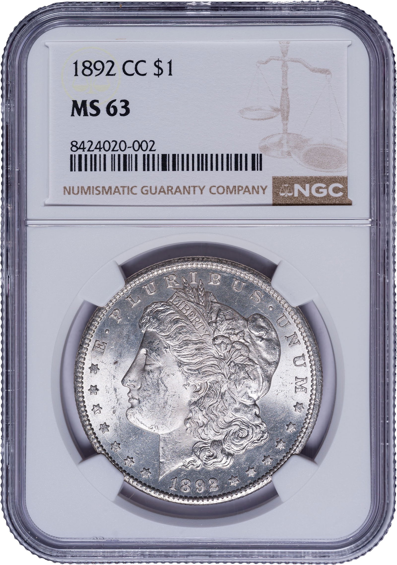 NGC MS-63 1892-CC Morgan Dollar: Bright and lustrous, and with a modicum of PL activity on the reverse. A desirable date and grade combination.