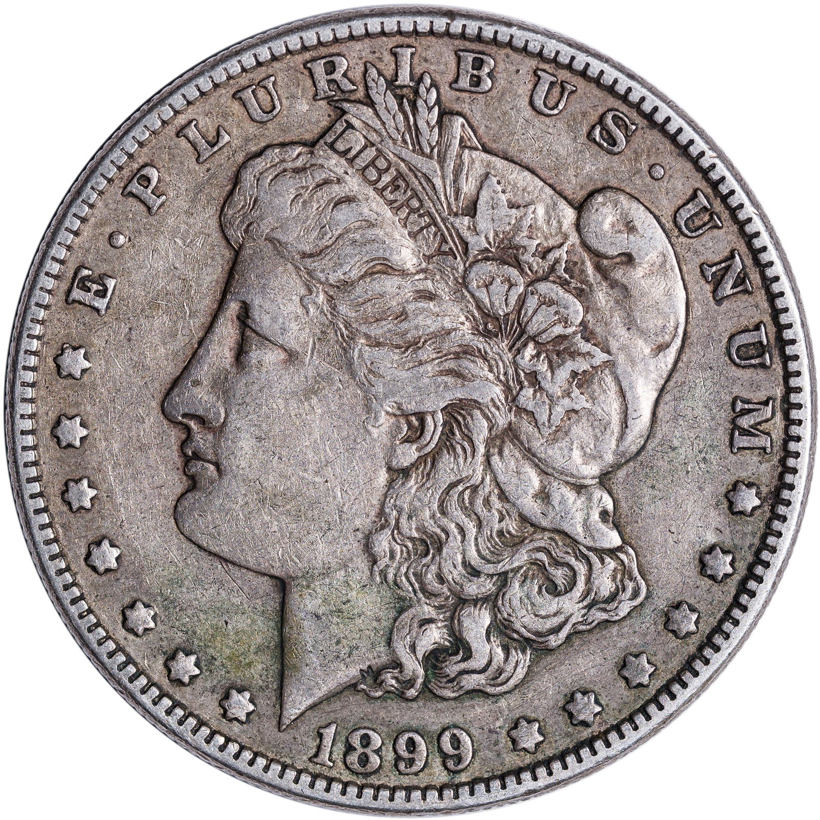 EF-40 1899 Morgan Dollar: A medium golden-gray example of this low-mintage Philadelphia issue.