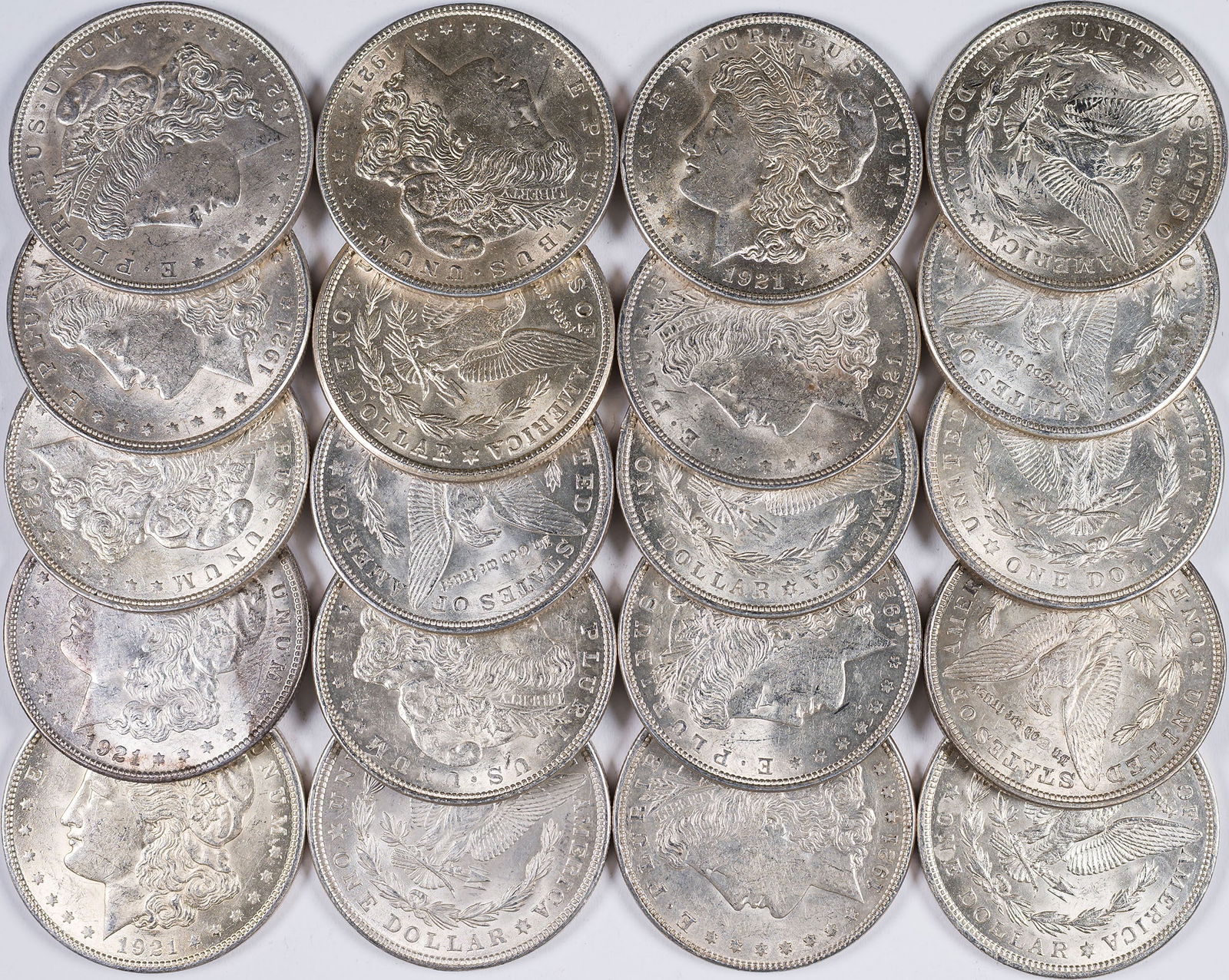 Roll Of AU 1921 Morgan Dollars: A nice lustrous roll that includes examples from all 3 mints.
