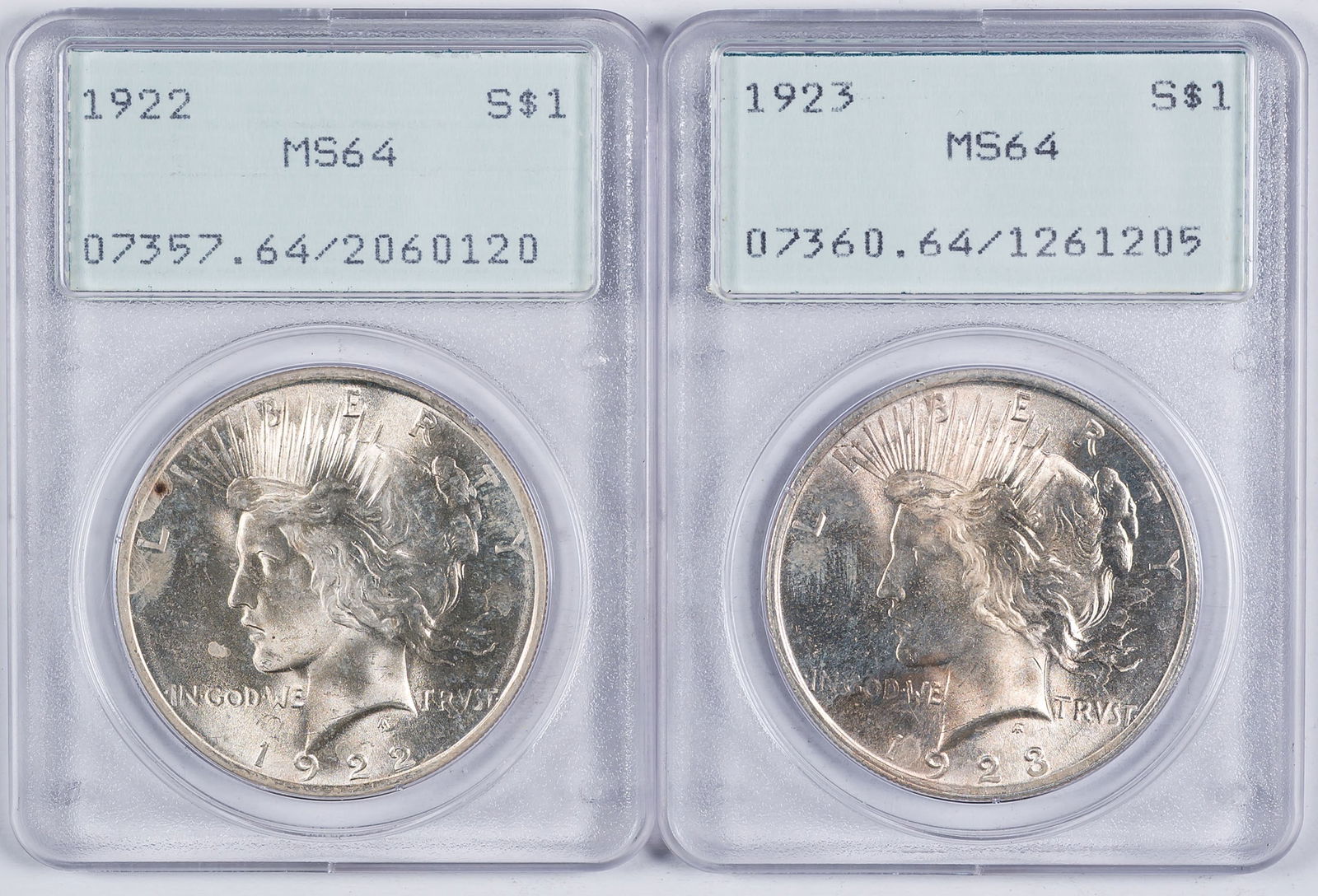 PCGS MS-64 1922 & 1923 Peace Dollars: Both are mostly brilliant and are housed in early generation PCGS holders. (Total: 2 pcs)