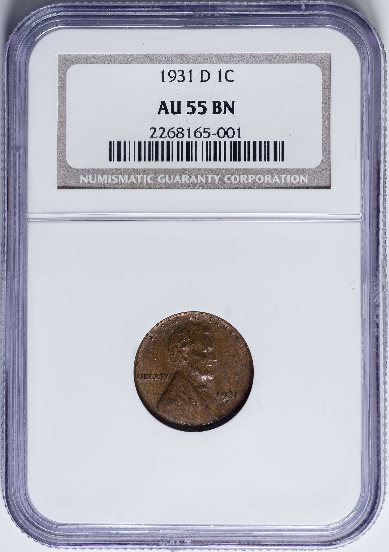 NGC AU-55 1931-D Lincoln Cent: Lustrous chocolate-brown surfaces offer a glossy appearance.