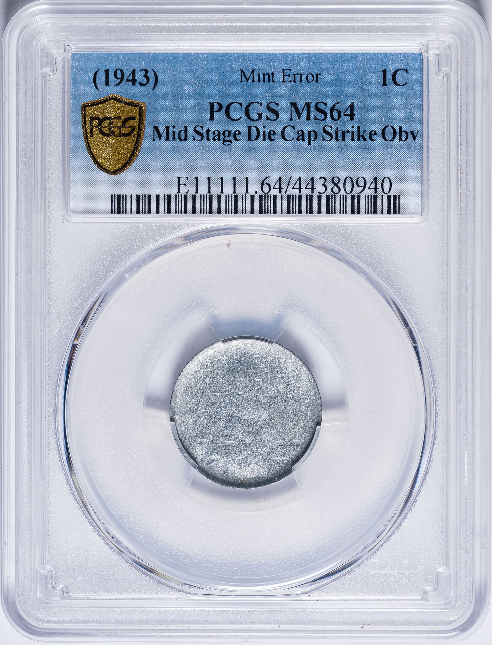 PCGS MS-64 (1943) Lincoln Cent Die Cap Error: An impressive mid stage Die Cap which shows the reverse design incused and enlarged on the obverse. Very Rare.