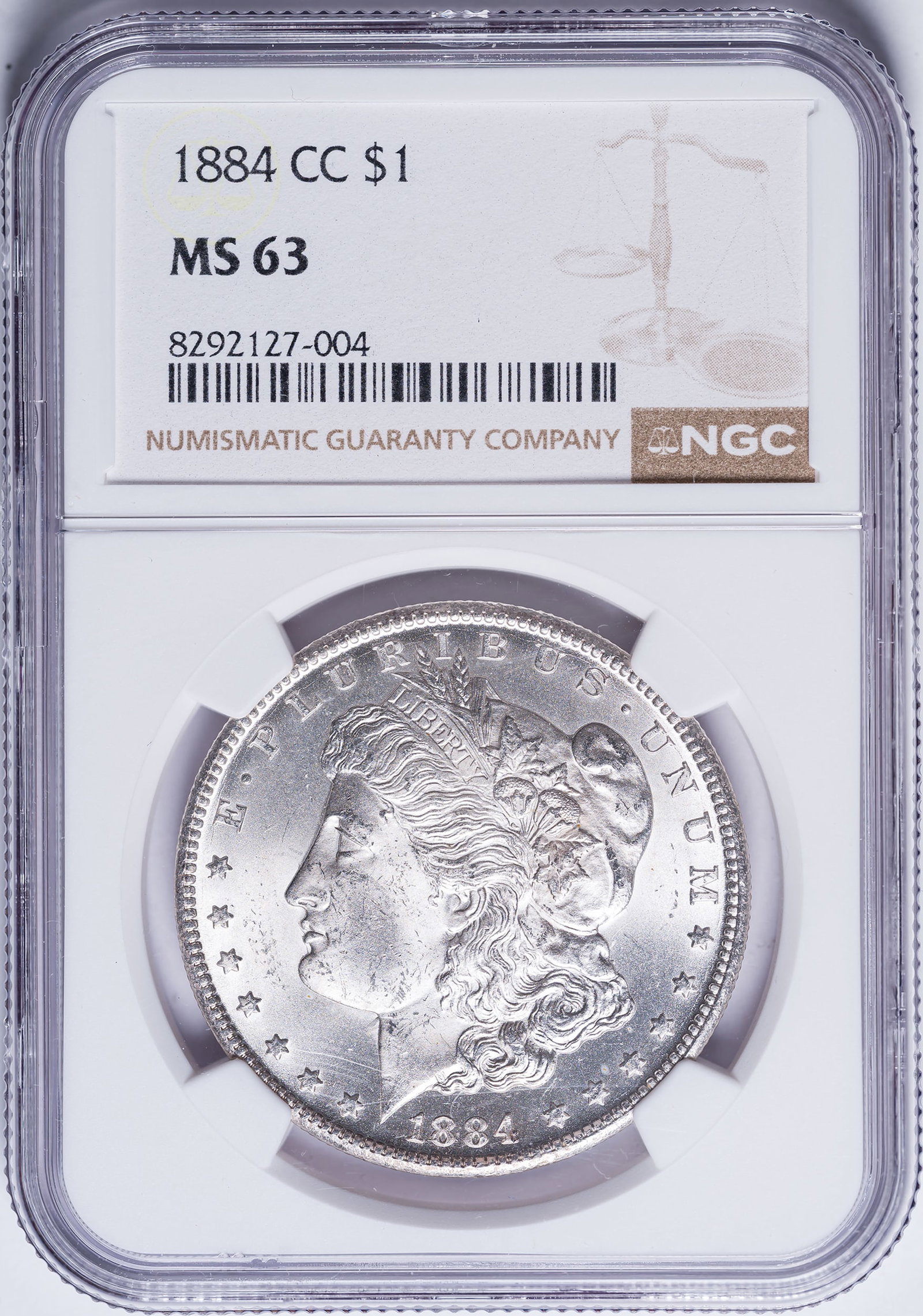 NGC MS-63 1884-CC Morgan Dollar: A frosty, sharp, and fully brilliant specimen that could just as easily be called MS-64 without much argument. Undeniably choice.