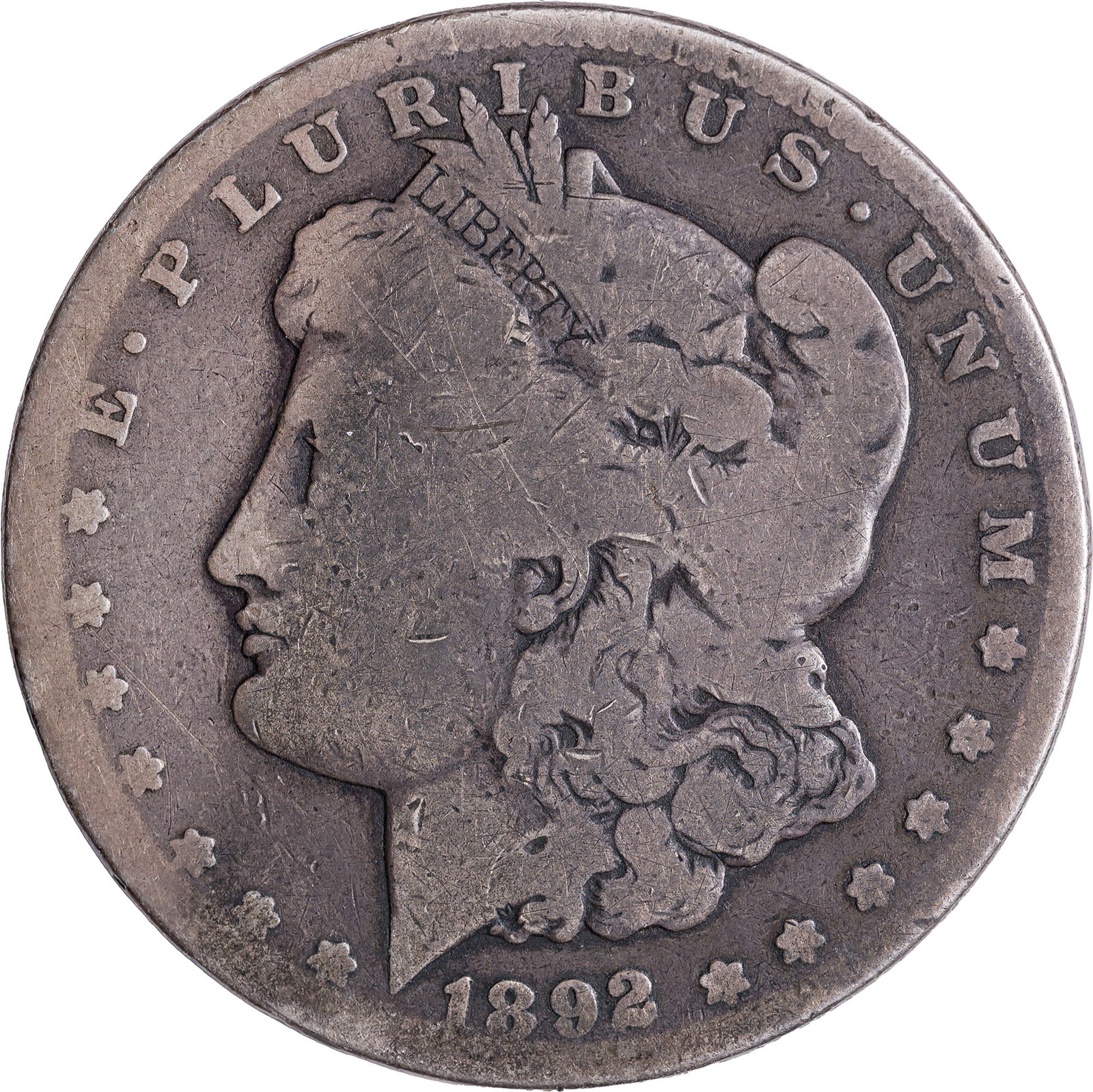 Good-4 1892-CC Morgan Dollar: Evenly worn deep steel-gray with golden-gray high points.