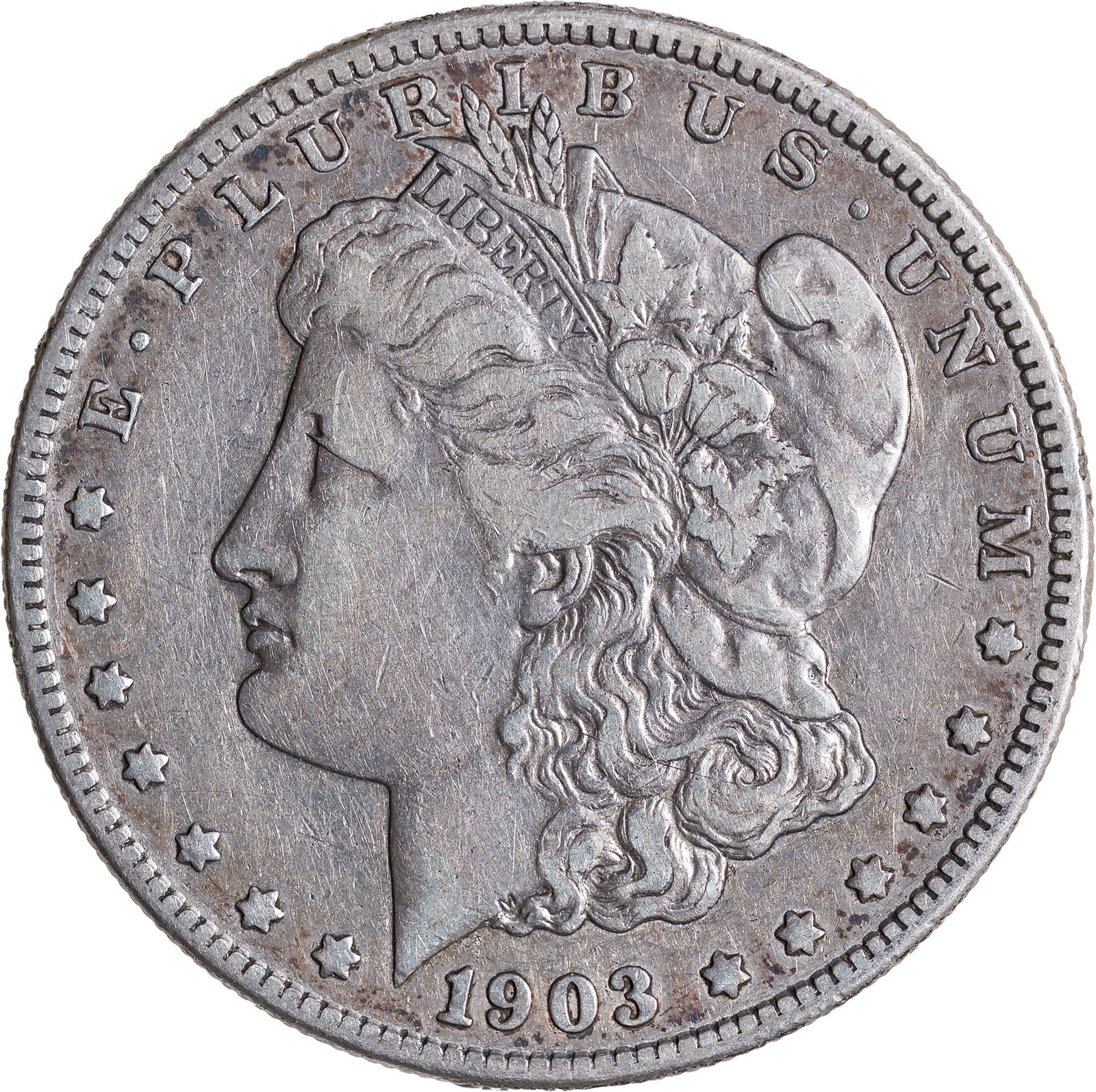 VF-25 1903-S Morgan Dollar: Pale steel-gray with light golden highlights. Evenly circulated but not marked to any visible degree.