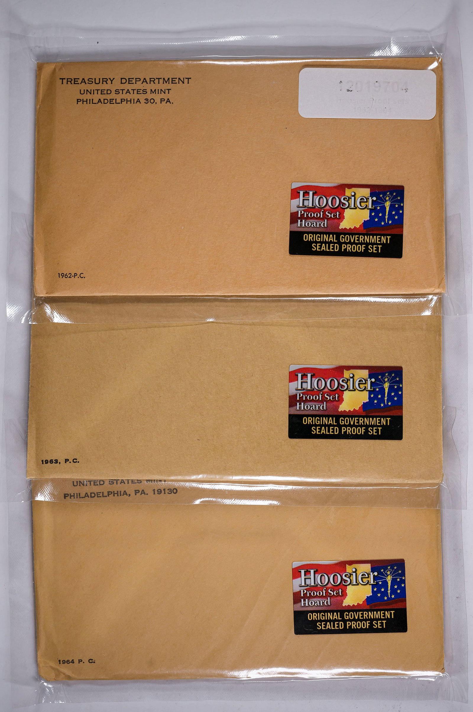 1962-64 Sealed Proof Sets: Each sealed envelope has been sealed in plastic. (Total 3 pieces)