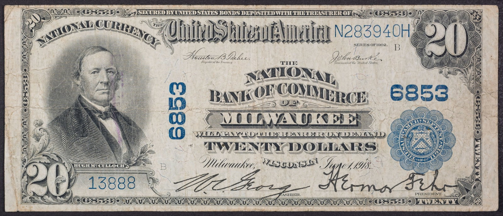 Wisconsin. VF 1902 National Currency $20: National Bank of Commerce of Milwaukee. Light creasing and faint wrinkling, but a solid note for the grade. Charter No. 6853.