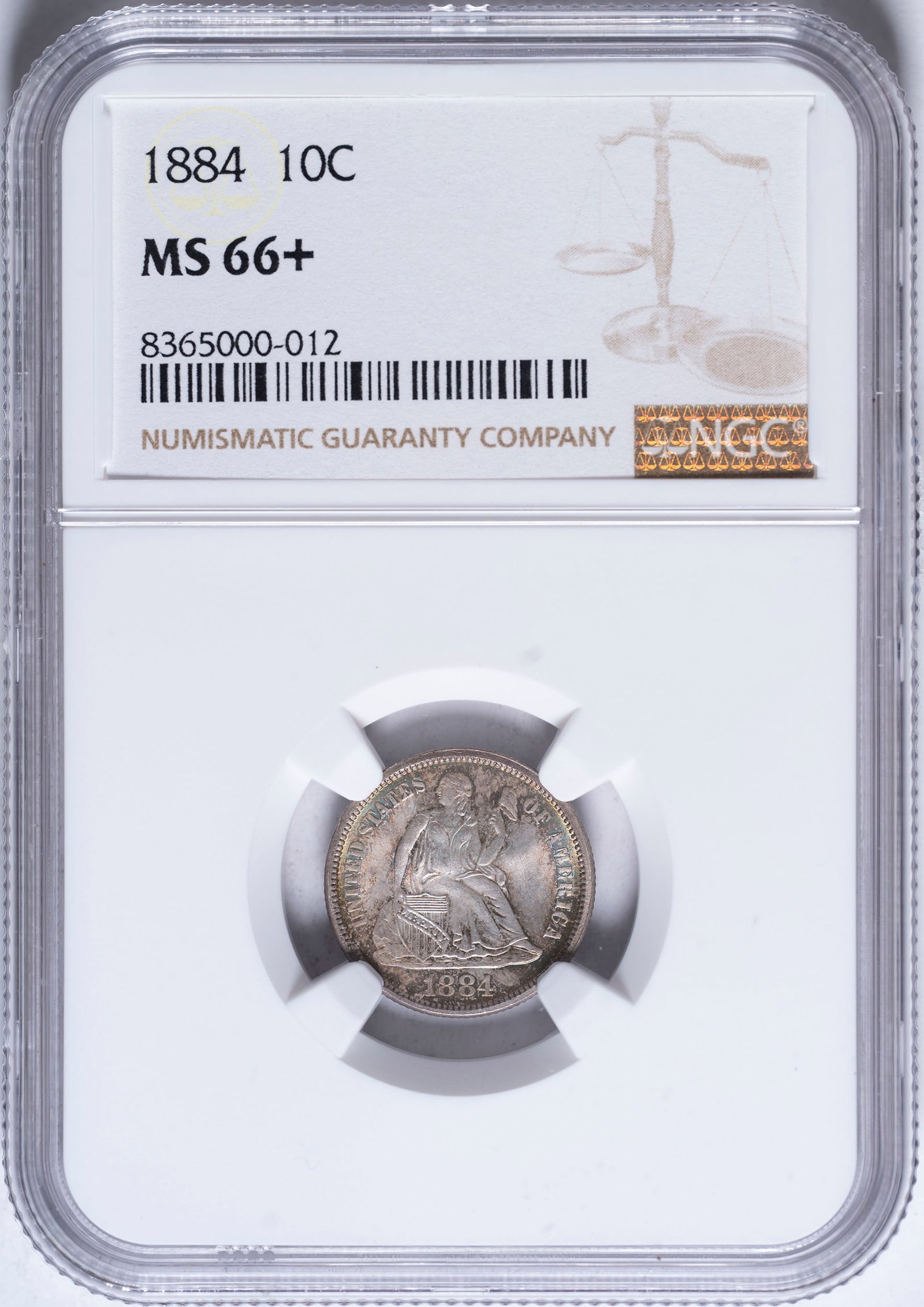 NGC MS-66+ 1884 Seated Dime: Intense cartwheel luster supports wispy gold and blue iridescence. As nice as you are apt to see at the assigned grade. Sharper than typically seen, here with full head details on the obverse, and wit