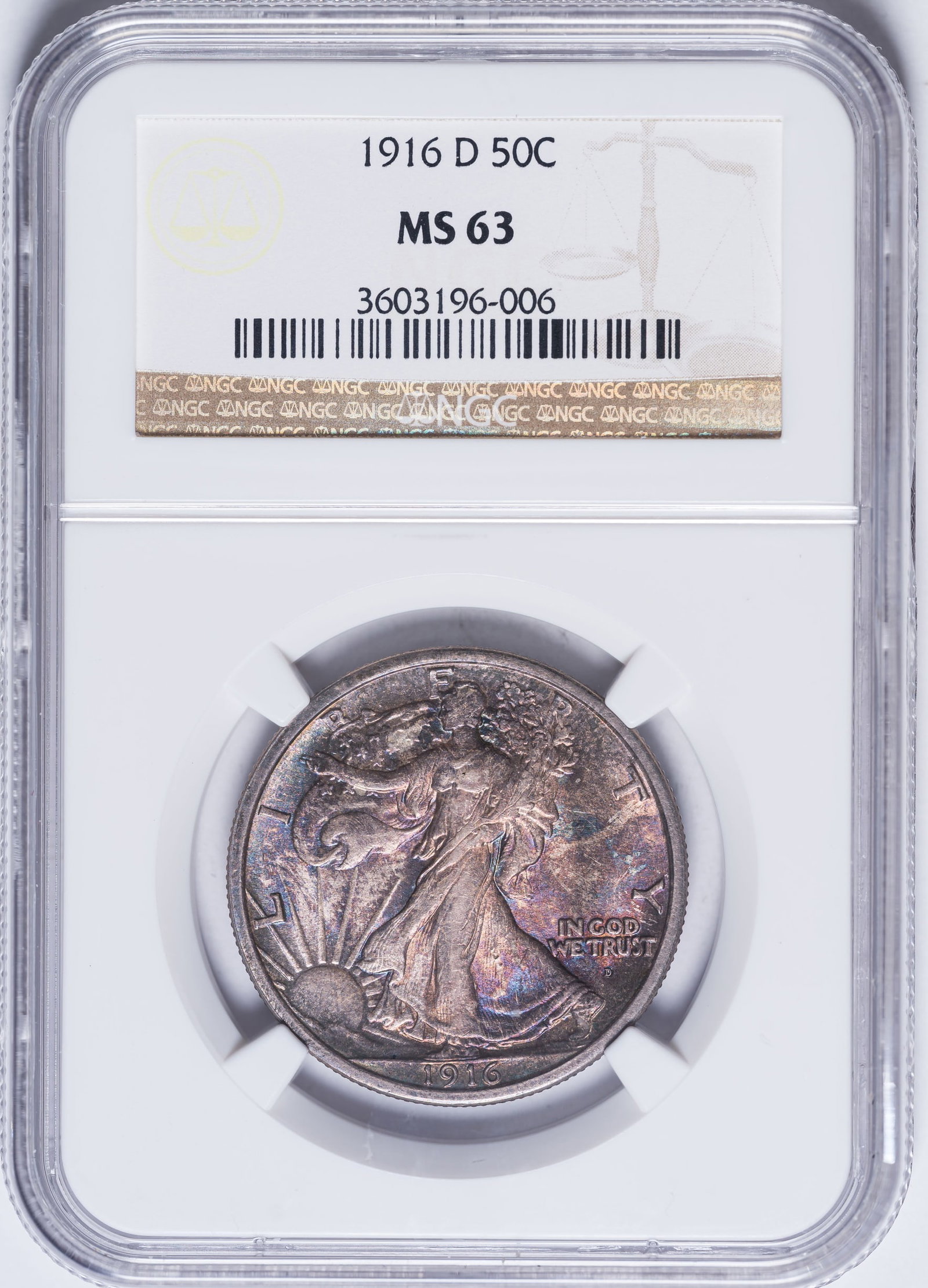 NGC MS-63 1916-D Walking Liberty Half Dollar: Richly toned. Underlying cartwheel luster supports a wealth of rich gold and crimson-violet toning on both sides.